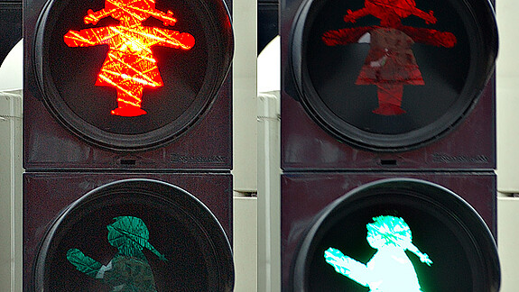 Koalitionsvertrag: Gute gleichstellungspolitische Vorsätze – Auf die Umsetzung kommt es an Fußgängerampel zeigt Ampelsignale als Frauenumrisse in Rot und Grün